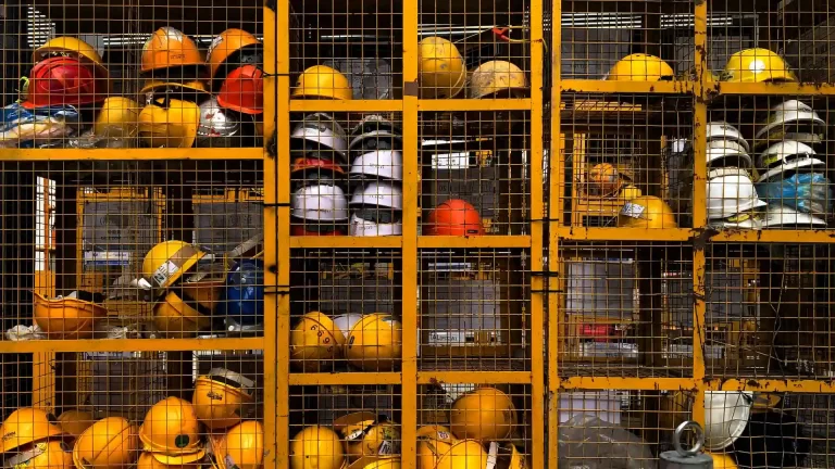 Saftey helmets in a storage container